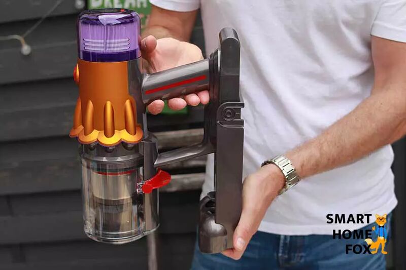 The wall mount for the Dyson V12 slim is shown with the vacuum.